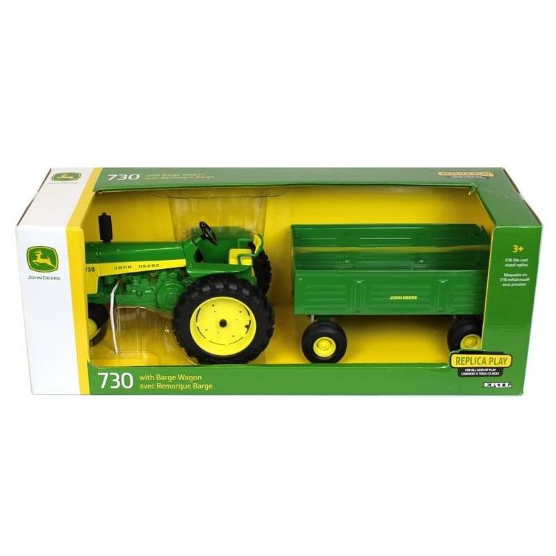 JOHN DEERE 730 para cultivos en hileras con remolque barcaza