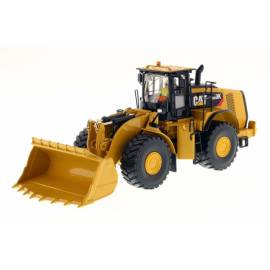 Cargadora de ruedas CATERPILLAR 980K con cuchara para rocas con conductor y caja metálica