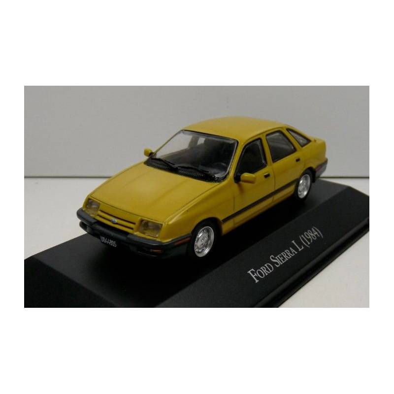 FORD Sierra I 1984 Amarillo con folleto