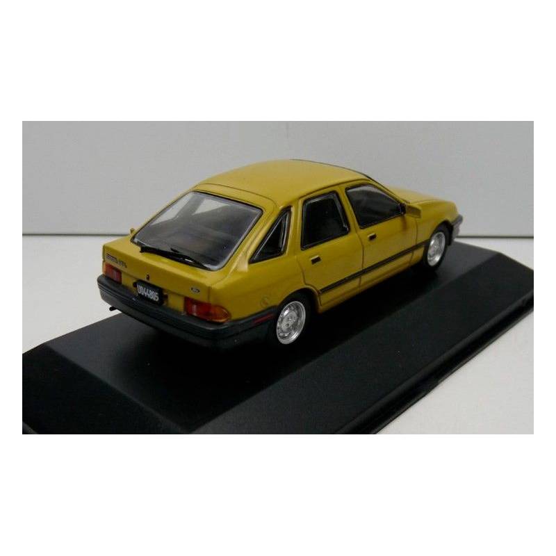 FORD Sierra I 1984 Amarillo con folleto