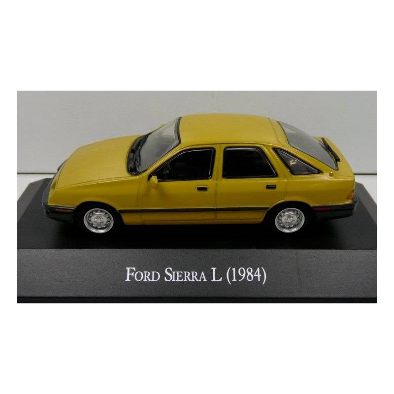 FORD Sierra I 1984 Amarillo con folleto